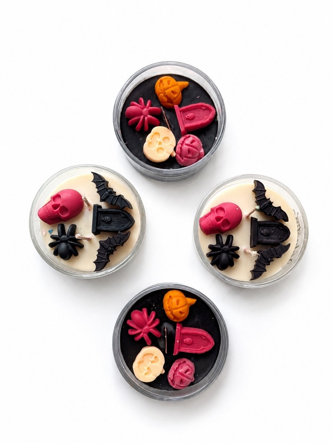 4 halloween themed candle jars by Velvetine Soirée - named Haunted Whimsy. Halloween decor