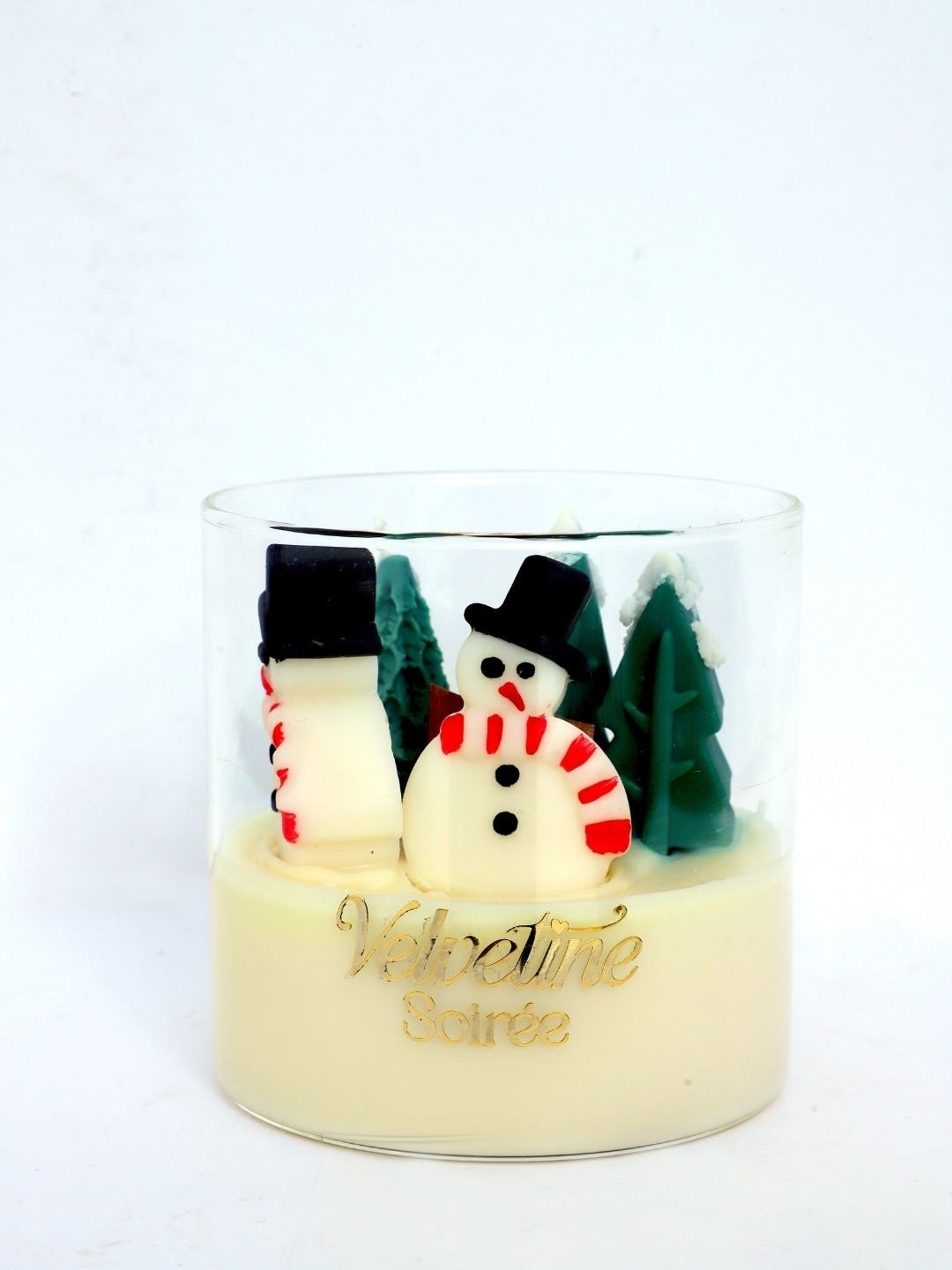 Frozen Wonder candle jar with miniature snowman and trees for decor and with special fragrance of patchouli, coffee gardenia