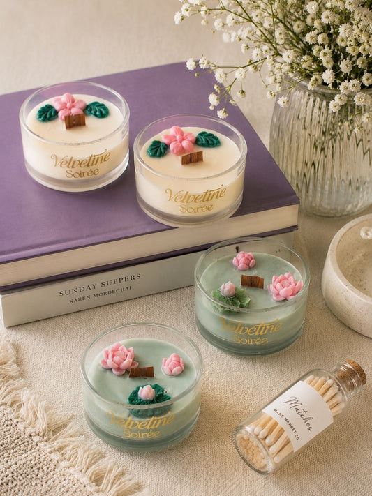 Four Candles jars placed on a beautiful able with vase, coconut wax candles with vanilla scent and musk scented candles